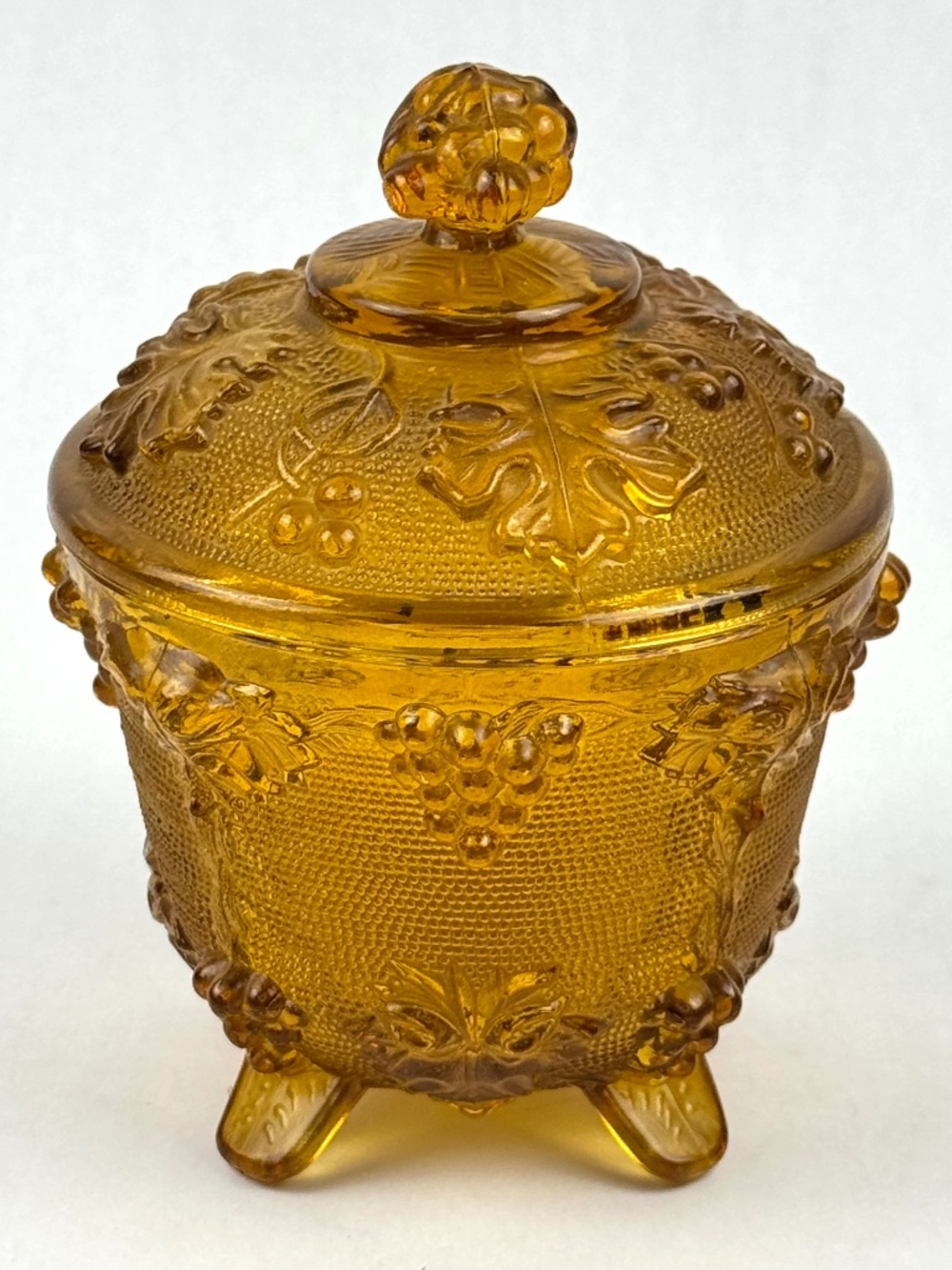 Vintage 1950s Jeanette Glass Amber Four Footed Candy Dish Grape & Vine With Lid